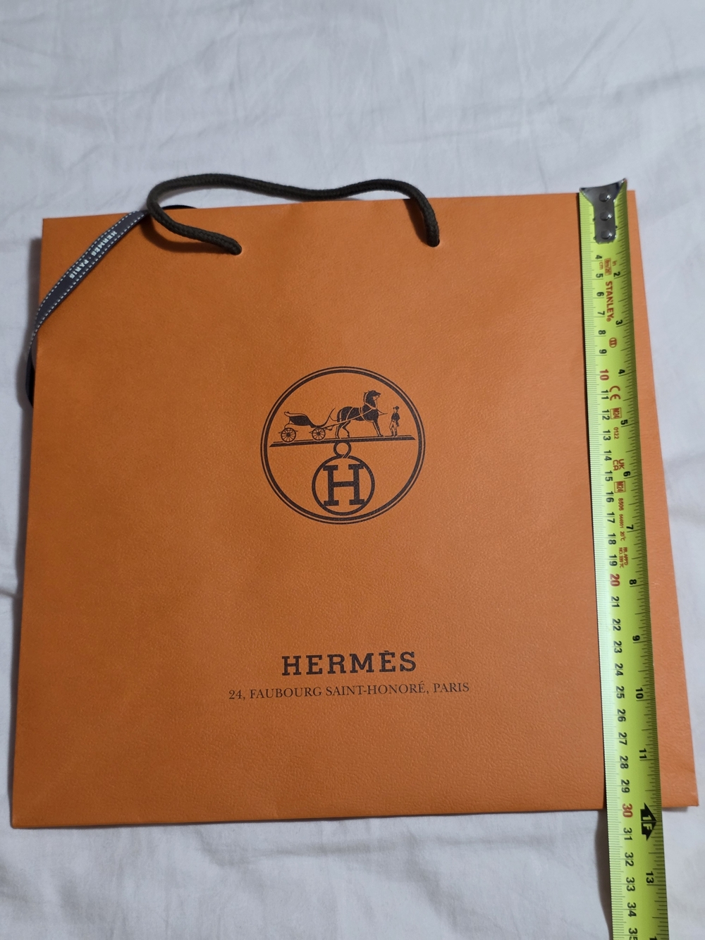 Hermès Orange Logo Shopping Bag with Dark Brown Rope Handles